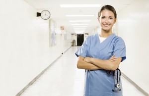 Young medical professional in clinic corridor