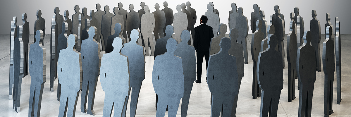 businessman standing among people silhouettes