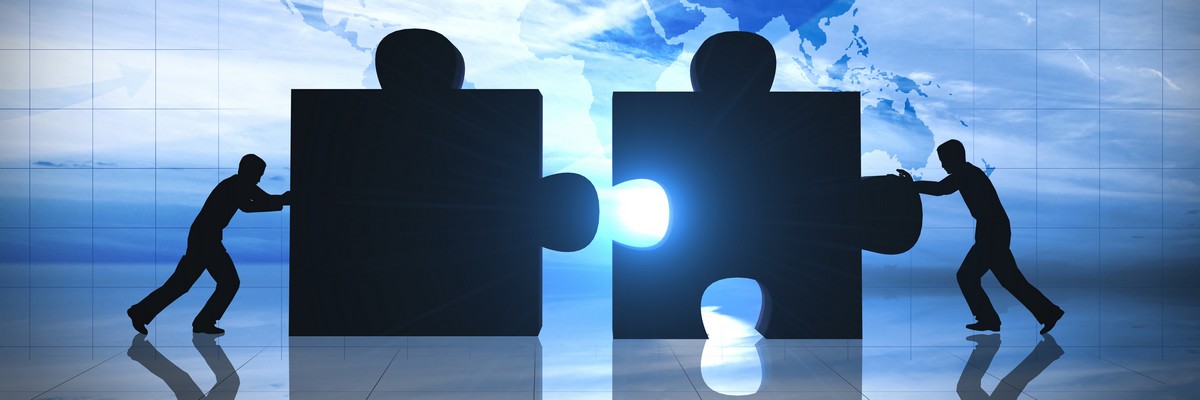 World Business teamwork puzzle pieces