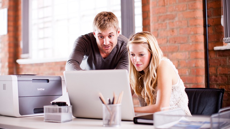 man-lady-working-together-laptop-bradmin-professional