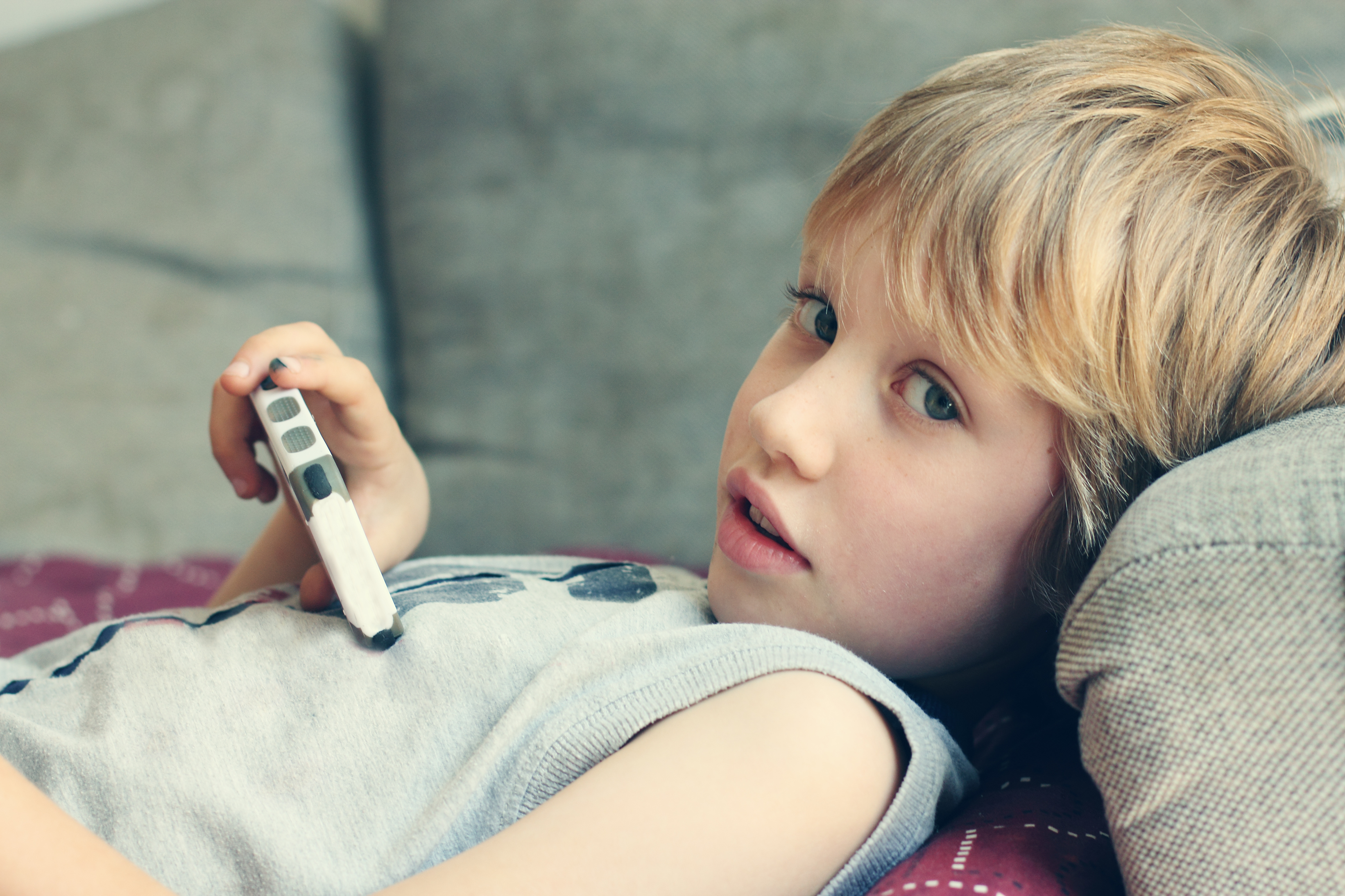 Cute boy with mobile phone