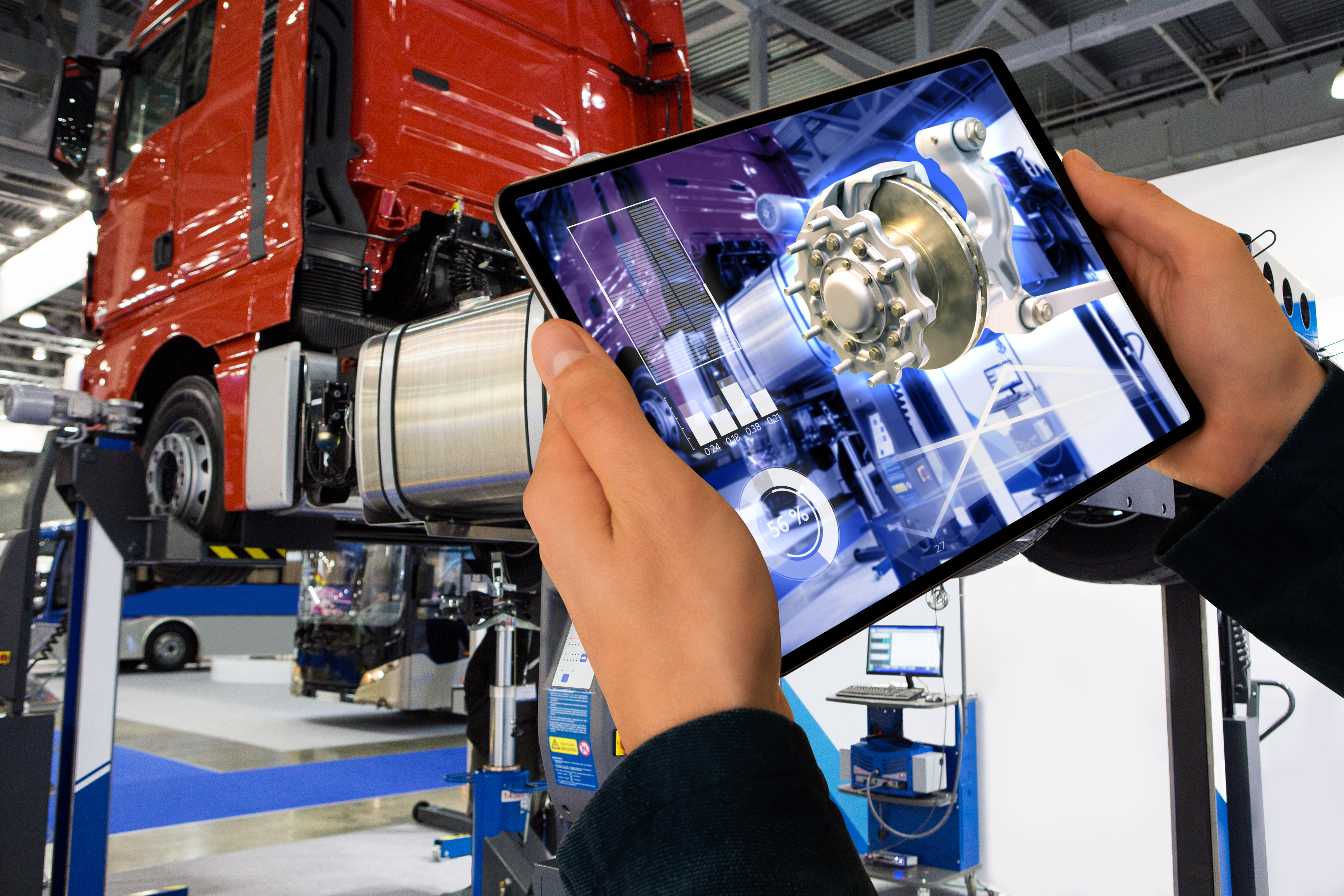 Repairing a truck using augmented reality application.