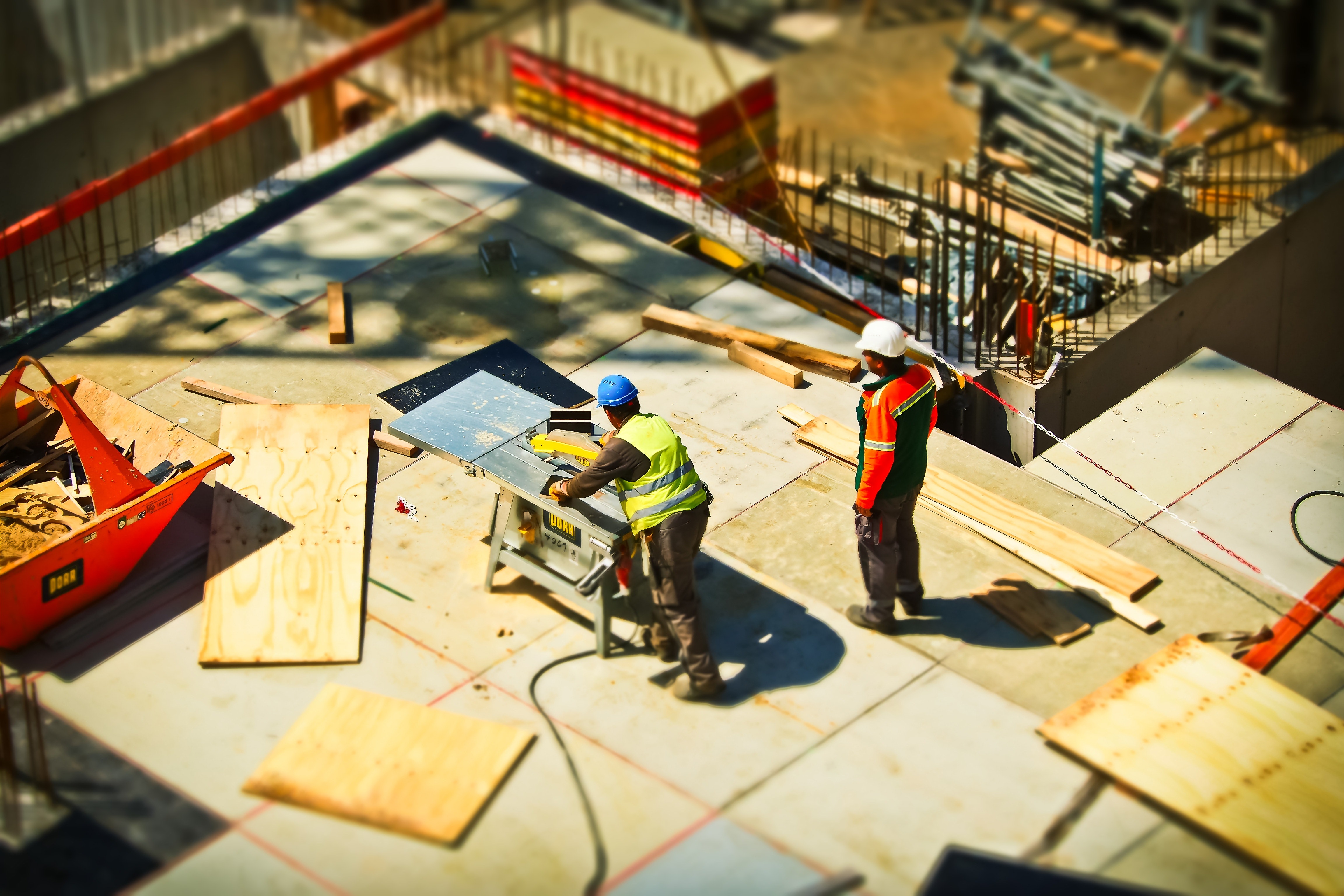 2-man-on-construction-site-during-daytime-159306