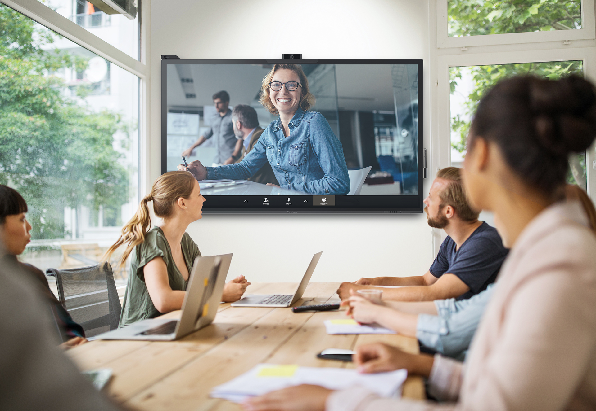 Startup business team having a video conference with investor