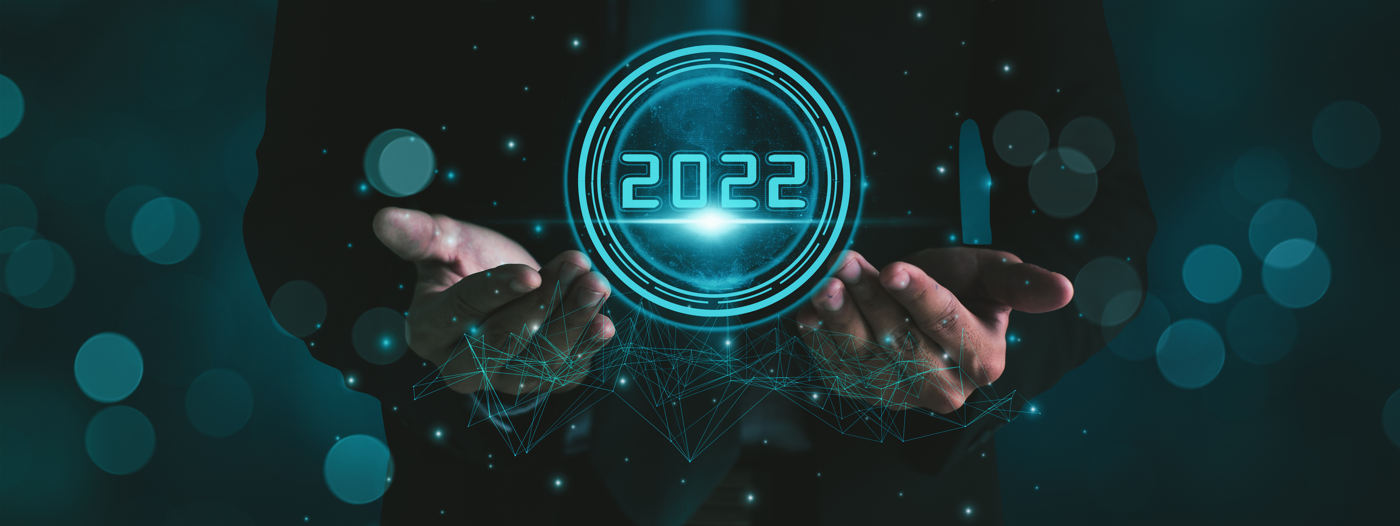 Businessman hand holding 2022 number,happy new year concept digital trends,industry and business trend of world full modernity advanced technology,artificial intelligence or AI,banner header panoramic