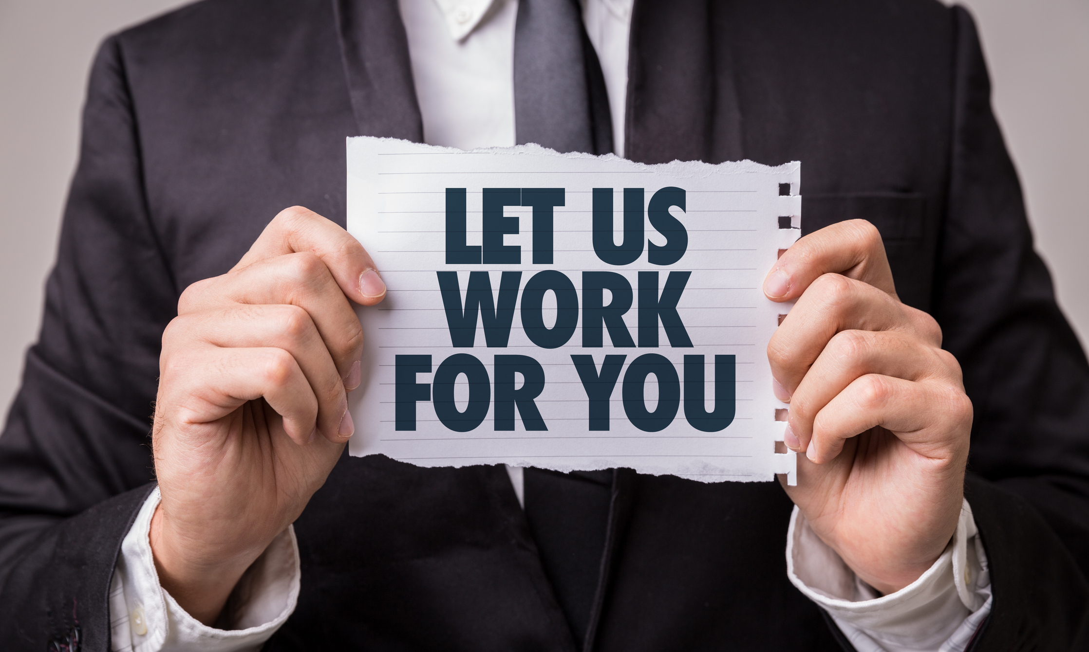 Let Us Work For You sign