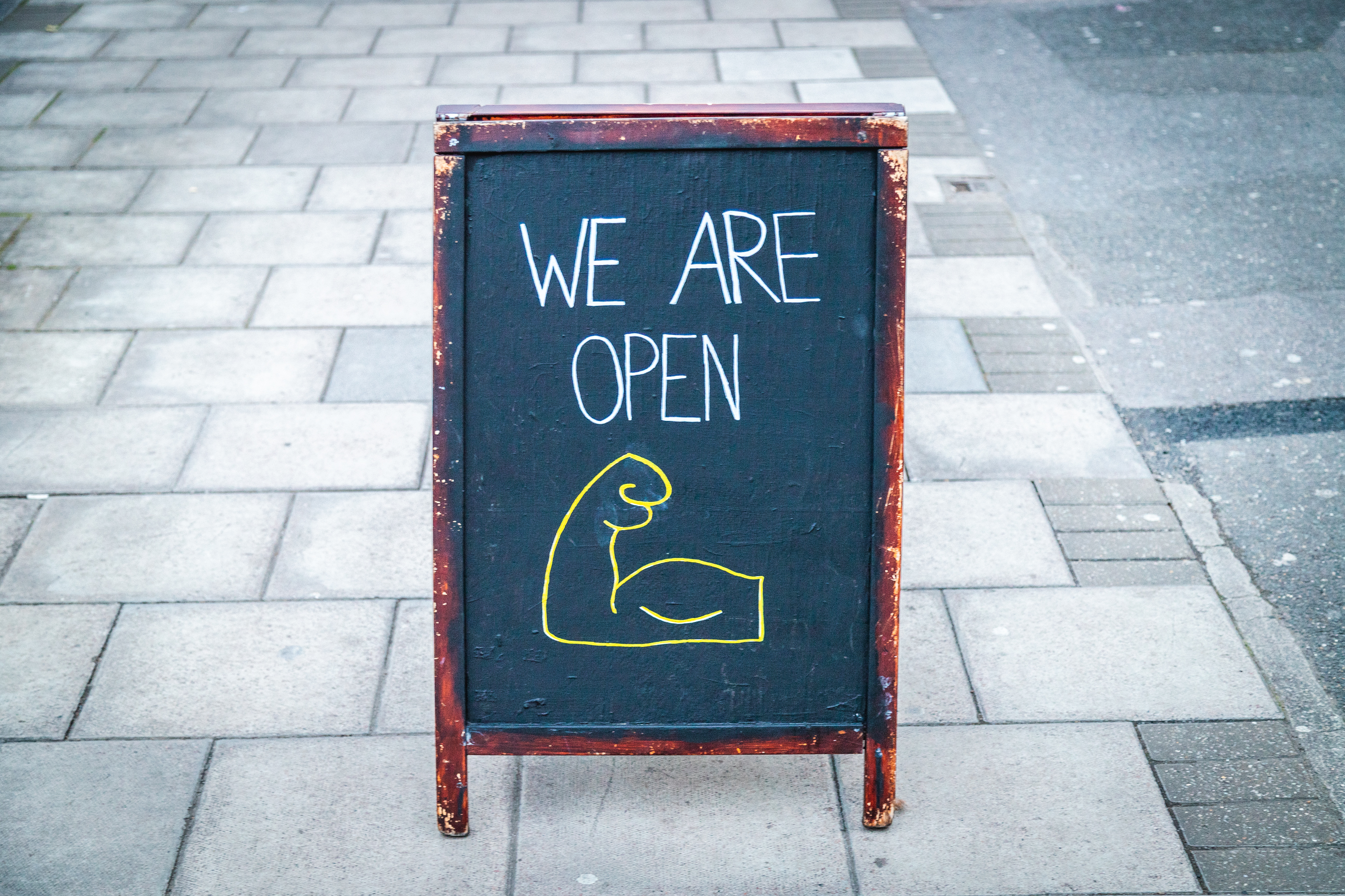 Open sign outside a shop