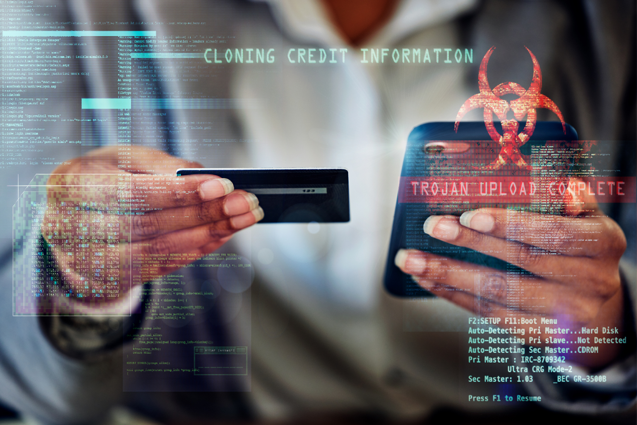 Cyber, digital and virus of criminal fraud breaking security with trojan and cloning software. Hands of an individual with malicious intent to steal, banking and finance information for ecommerce.