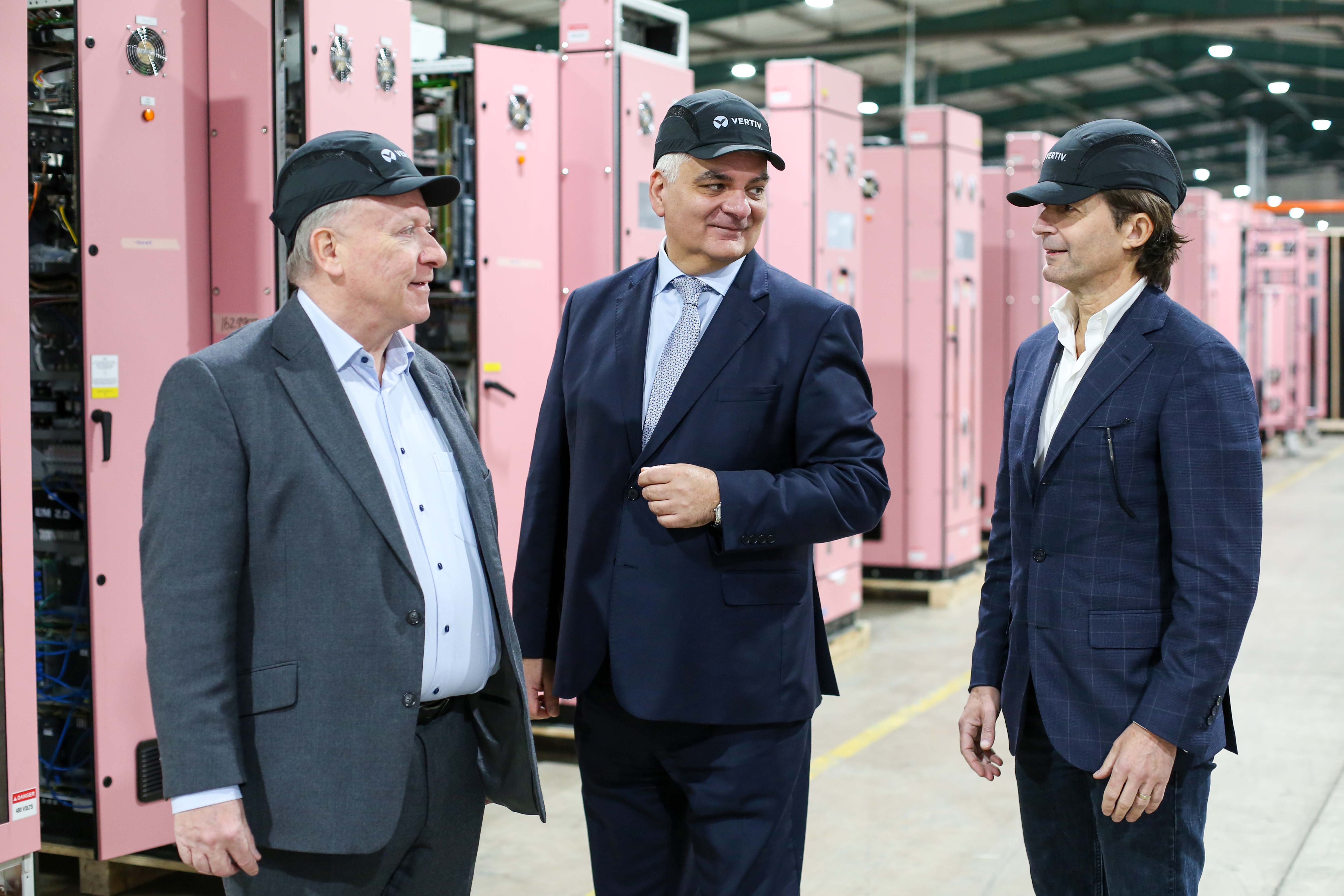 Vertiv jobs announcement Vertiv CEO, Giordano Albertazzi, right, with Philip O’Doherty, managing director of E&I business, Vertiv, and Mel Chittock, interim CEO, Invest NI during a tour of the Campsie site following the announcement of approx. 200 new jobs Credit © Lorcan Doherty