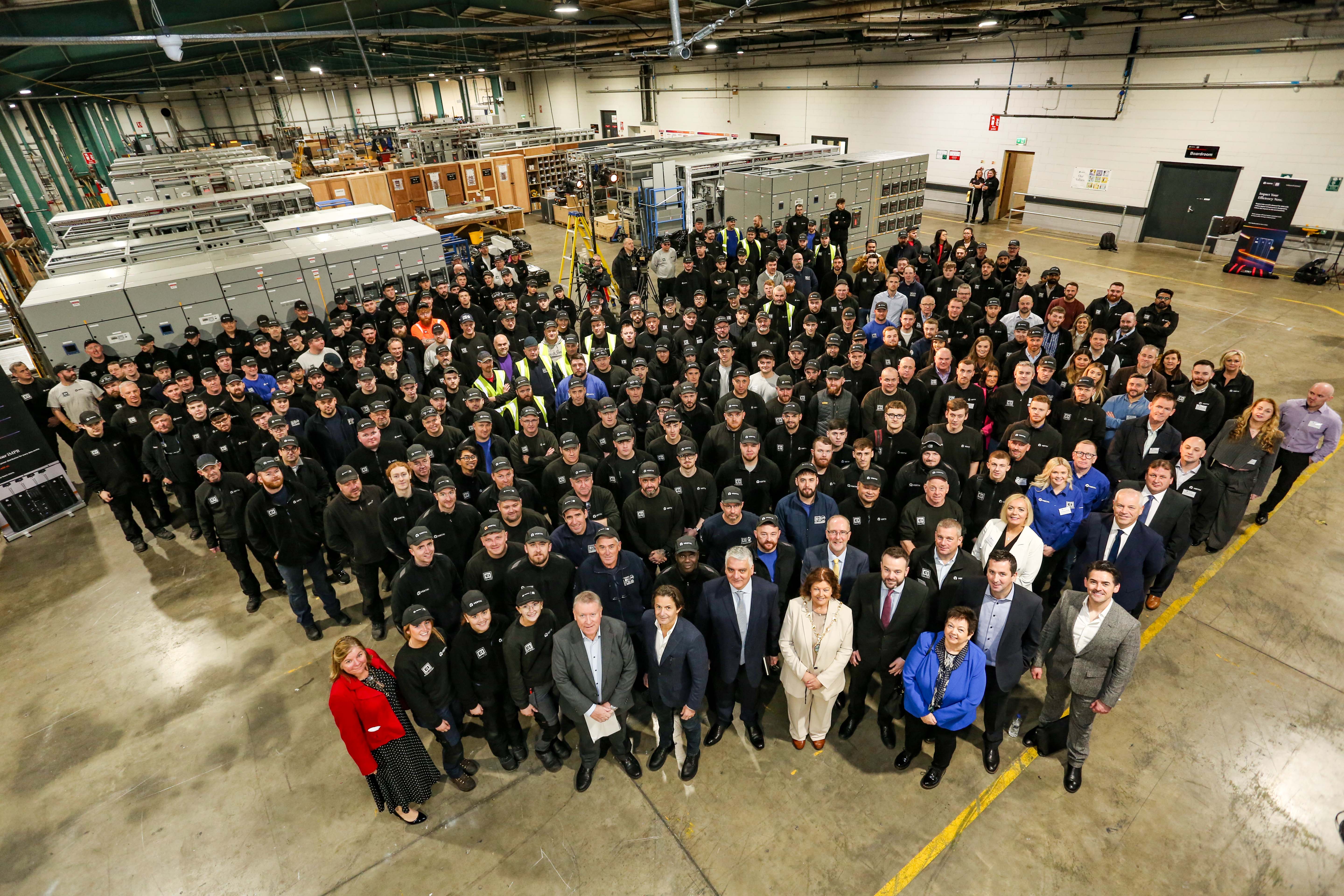 Vertiv jobs announcement Staff at Vertiv, Campsie, following the announcement of approx 200new jobs. Included are Vertiv CEO, Giordano Albertazzi, Philip O’Doherty, managing director of E&I business, Vertiv, Mel Chittock, interim CEO, Invest NI, The Mayor of Derry and Strabane, Councillor Patricia Logue, Colum Eastwood, Foyle MP, during a tour of the Campsie Credit © Lorcan Doherty