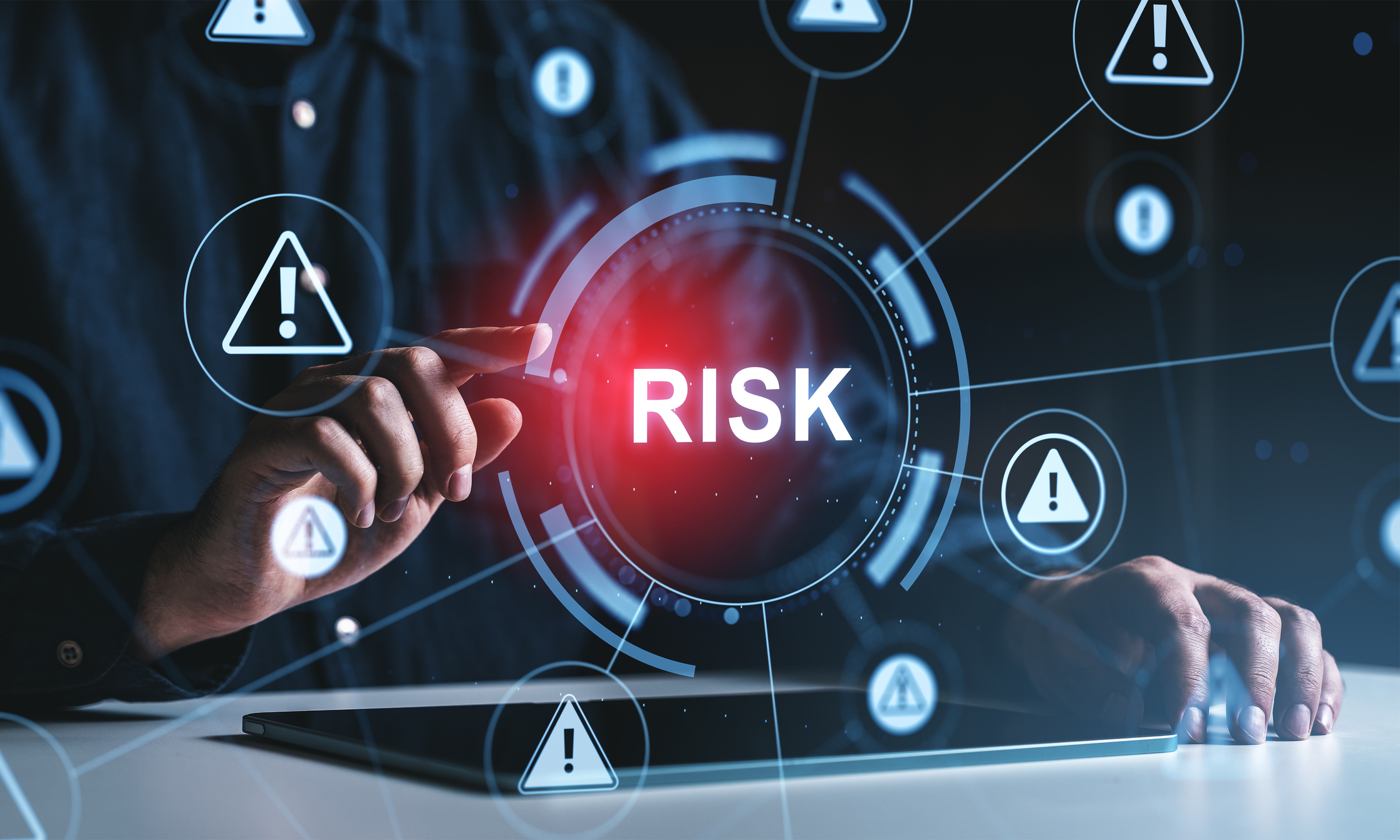 Risk management concept with digital warning icons and touchscreen interface in futuristic creative style on dark background showing security alerts.